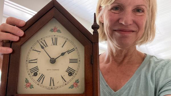 Anne and a clock
