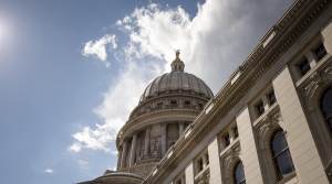Clouds and a blue sky are the backdrop for the Wisconsin State Capitol