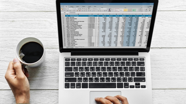 A person with a laptop working from home.