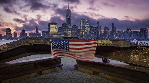 A U.S. flag hanging from a steel girder, damaged in the Sept. 11, 2001 attacks on the World Trade Center