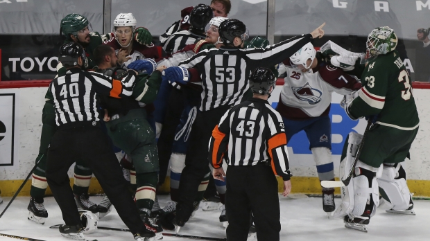 Hockey players fighting