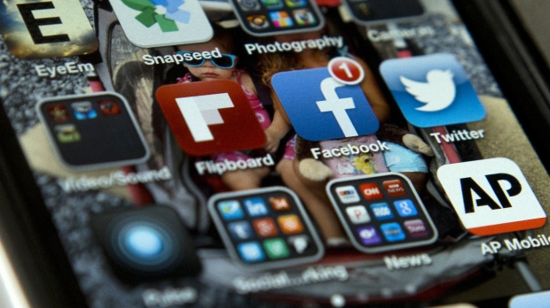 Social media icons on an iPhone screen