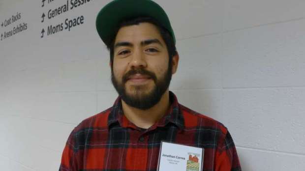 Photo of a bearded, plaid-shirted Jonathan Correa