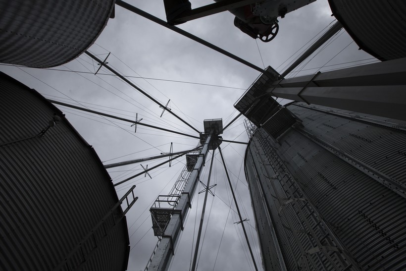 Farm silos overhead store corn on a rainy day