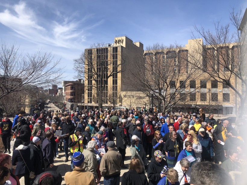 protesters gather on the steps of the state Capitol protesters gather on the steps of the state Capitol