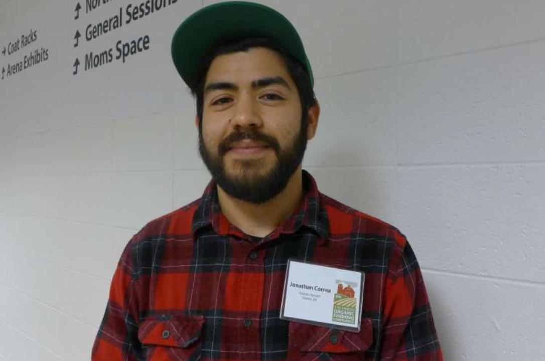 Photo of a bearded, plaid-shirted Jonathan Correa